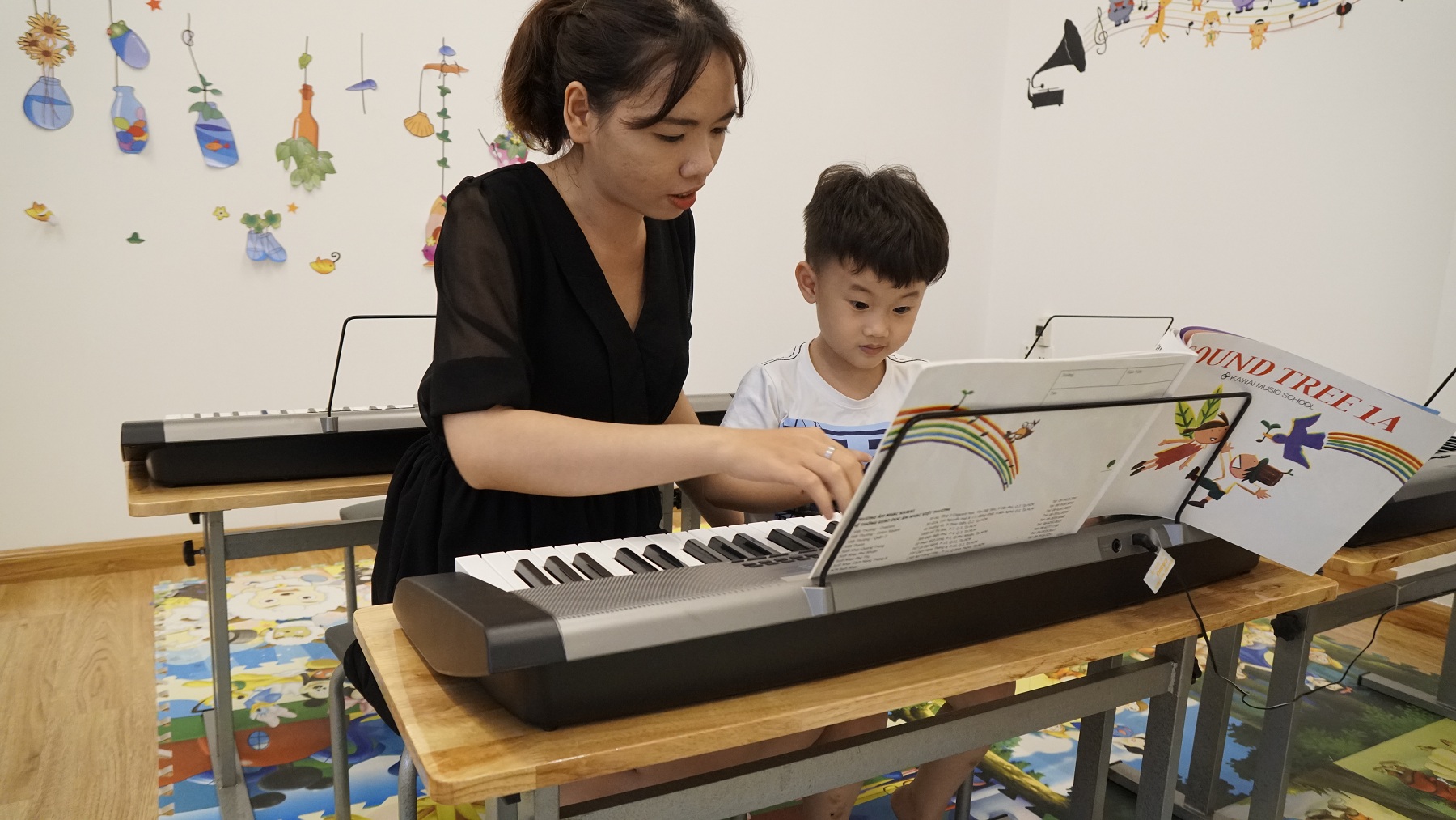 gia sư dạy đàn Guitar organ piano ukulele tại nhà